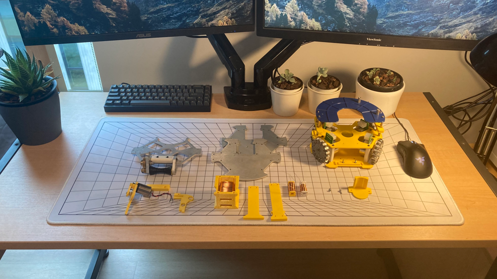 Robot soccer parts arranged on a workbench